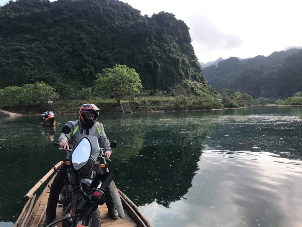 Onyabike Adventures motorbike ride on a paddle boat in Vietnam