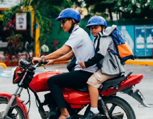 father and son wearing the wrong helmet in Vietnam