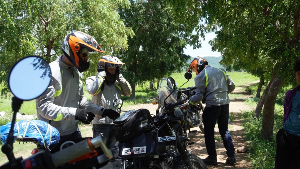 helmets and safety gears on an offroad motorbike rental in Vietnam