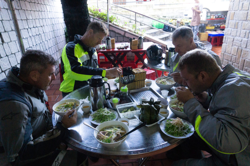Onyabike Adventure riders enjoying their Vietnam food tour