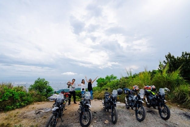 A group of motorcycle riders at Hai Van Pass