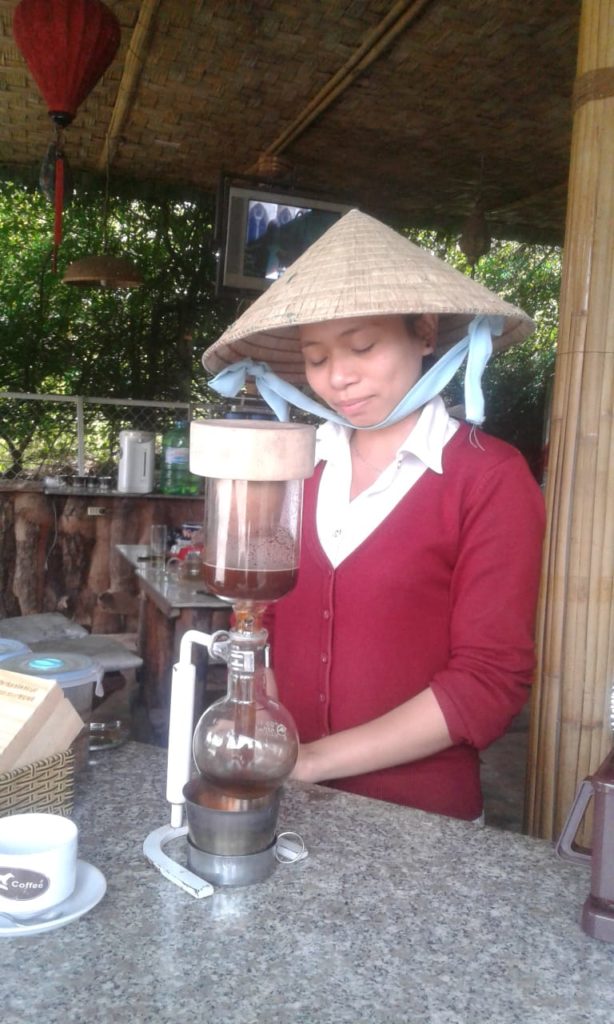 Woman prepares weasel coffee