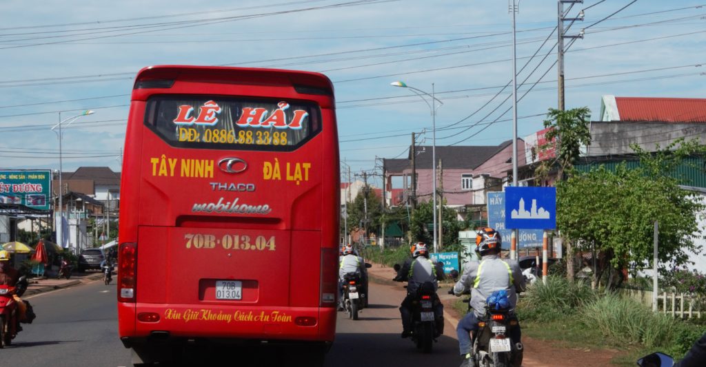 Buses and motorbikes getting around Vietnam